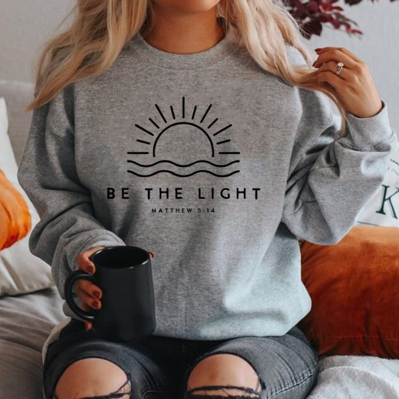 Gigi | Stijlvolle Sweater "BE THE LIGHT"